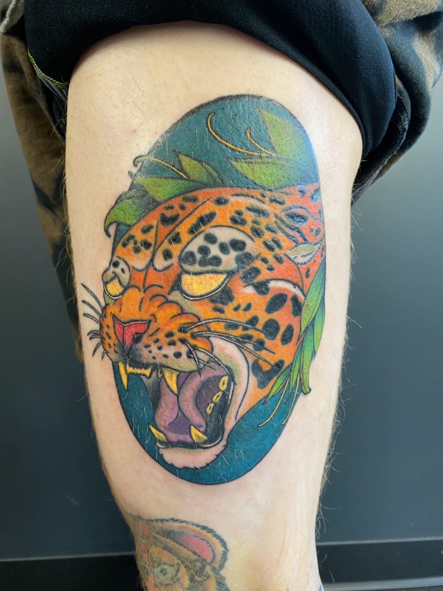 A colored cheetha tatoo