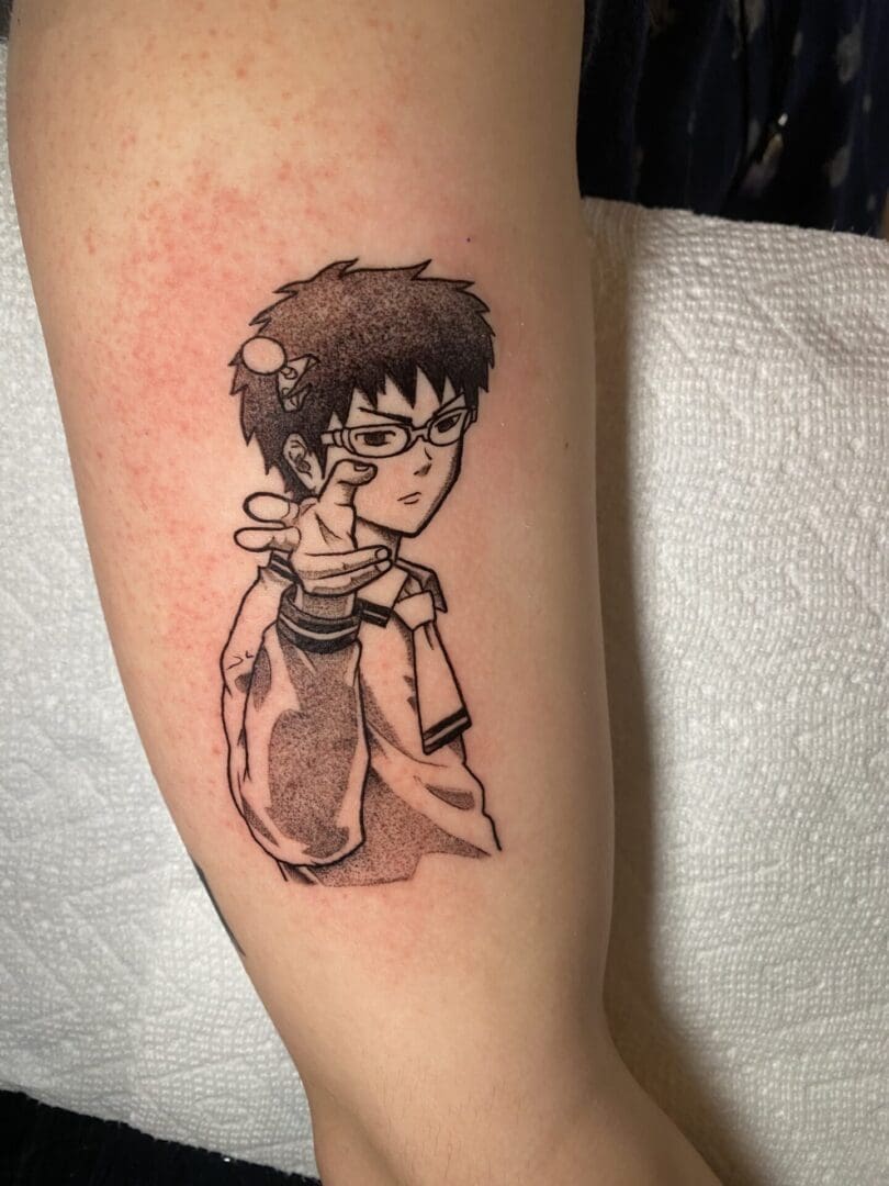 Cartoon characters of a boy tattoo printed on hand